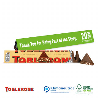 TOBLERONE Riegel im Werbeschuber, 100 g, Klimaneutral - Milchschokolade von TOBLERONE (100 g), mit Honig- und Mandel-Torrone