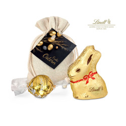 Geschenkartikel / Präsentartikel: Goldenes Ostersäckchen mit Lindt Goldhase und Lindorkugel Geschenkartikel / Präsentartikel: Goldenes Ostersäckchen mit Lindt Goldhase und Lindorkugel